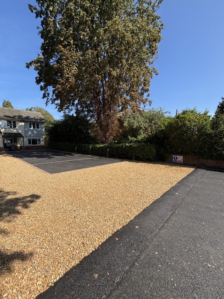 asphalt speedbump on car park to nursery made from asphalt and shingle