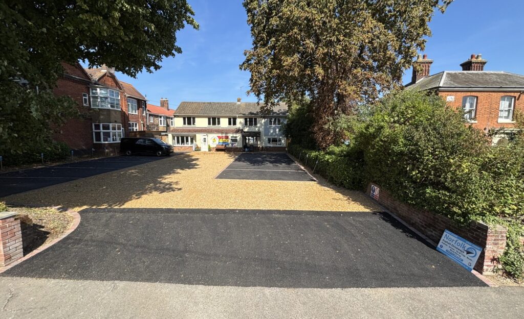 Car park in dereham, norfolk at a nursery half of asphalt and half shingle, custom car park design