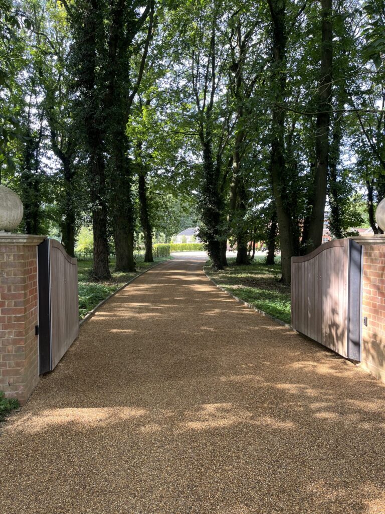 New tar and chip surface using k 170 tar and a norfolk 6mm golden gravel shingle on an entrance to a big countryside house in north elmham, norfolk